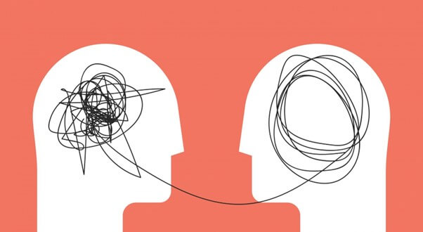 Graphic image of the silhouettes of two heads with connecting lines representing their brains listening to each other.